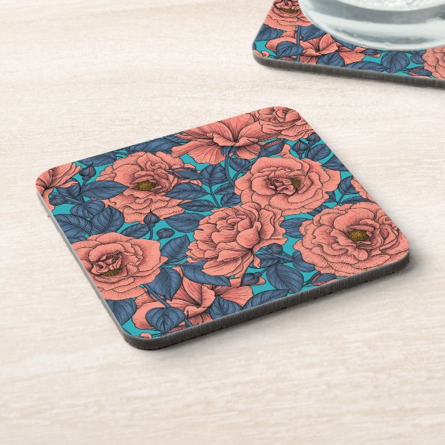 Pink roses with blue leaves on blue beverage coaster (Left Side)