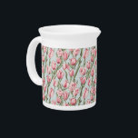Pink Row Serenity Beverage Pitcher<br><div class="desc">A captivating line of delicate pink tulips stands in graceful formation,  their soft hues creating a tranquil contrast against a vibrant,  calming backdrop of lush green. This arrangement embodies a serene elegance,  where simplicity and harmony bloom in perfect unison.</div>