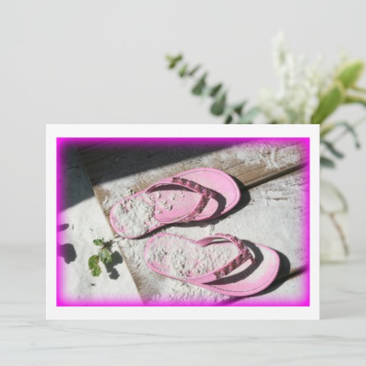 Pink sandy flip flop sandals on Florida beach (Standing Front)