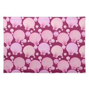 Pink sea shells on a burgundy background placemat