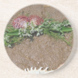 Pink Shells And White Flowers On Beach Sand Drink Coaster at Zazzle