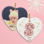 Pink Star Golden Accents Pattern Ceramic Ornament<br><div class="desc">Celebrate the joy of your baby girl's first Christmas with this enchanting pink star ornament, beautifully adorned with golden accents. The whimsical design exudes warmth and charm, perfect for creating a heartfelt keepsake. Personalize it with her name and the year to commemorate this special occasion. Order today to add a...</div>