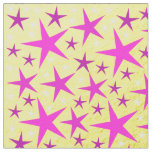 pink stars in gold background fabric