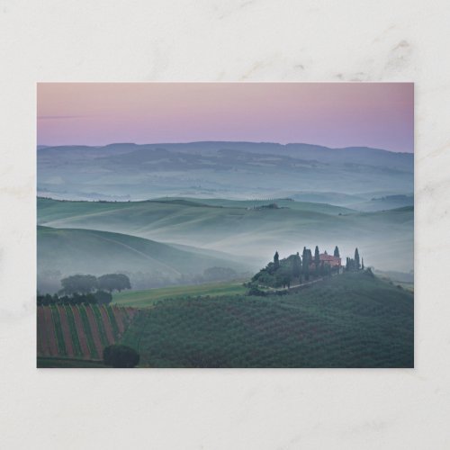 Pink sunrise over a Tuscany landscape postcard