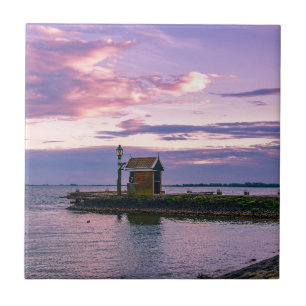 Pink sunset over lake ceramic tile