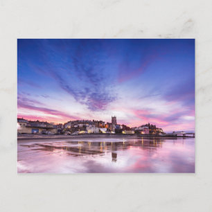 Pink sunset reflections over Cromer town at dusk Postcard