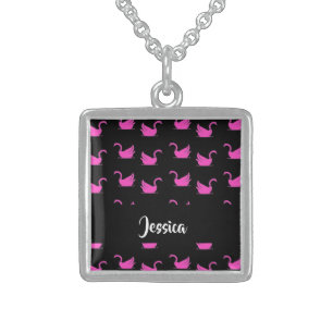 Pink swans silhouette on black sterling silver necklace