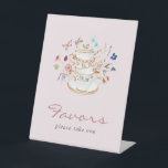 Pink Tea Party Favors Pedestal Sign<br><div class="desc">Enhance your favor table with our Blush Pink Wildflower Bridal Tea Party Favor Sign. Featuring stunning hand-painted watercolor florals in deep purple, dusty blue, and blush pink with sage greenery, this sign beautifully adorns cream and gold floral teacups and saucers, all set against a delicate blush pink background with a...</div>