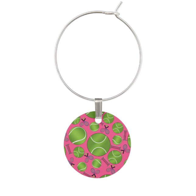 Pink tennis balls rackets and nets wine glass charm (Front)
