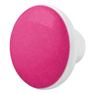 Pink textured surface with subtle swirling pattern ceramic knob