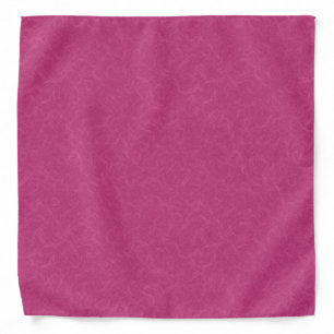 Pink textured surface with swirling pattern bandana