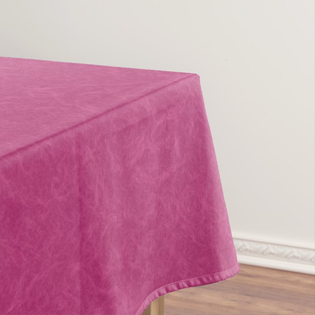 Pink textured surface with swirling pattern tablecloth (In Situ)