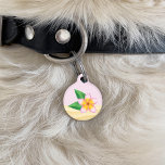 Pink Tropical Frangipani Flower & Custom Info Pet ID Tag<br><div class="desc">Destei's illustration of a pink frangipani plumeria flower with green leaves. The background color is light pink with sand texture on the bottom. On the back there are personalizable text areas for the name of the pet and for a phone number.</div>