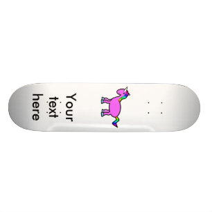 Pink unicorn with rainbow mane skateboard deck