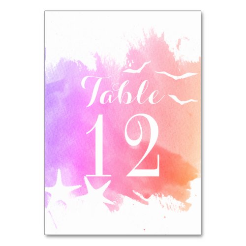 Pink watercolor starfish wedding table number
