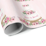 Pink Watercolor Wedding Cake Wrapping Paper<br><div class="desc">A white wedding cake decorated with pretty pink watercolor flowers sits on a stand against a pale pink watercolor wash background. The phrase "Love is Sweet" wraps around the cake but the text can be easily changed. Adds a feminine look to your gift for a bridal, couple's, or wedding shower,...</div>
