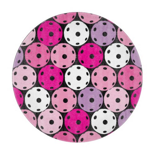 Pink white and purple pickleballs cutting board