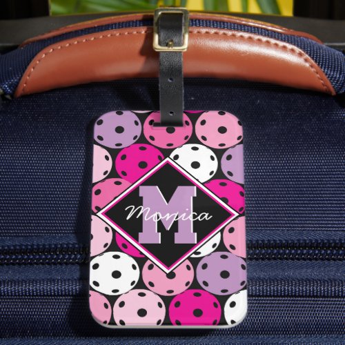 Pink white and purple pickleballs with name luggage tag