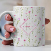 https://rlv.zcache.com/pink_wild_flower_illustrated_monogram_coffee_mug-r_7o55zp_166.jpg