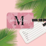 Pink World Map Custom Name Monogram Luggage Tag<br><div class="desc">A playful pink luggage tag featuring a world map silhouette, bold serif initial, and elegant script last name. This charming monogram design is a standout travel accessory and a popular gift for bridesmaids, graduates, or anyone with a passion for exploring. Personalize the initial and name to make every trip feel...</div>