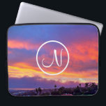 Pink yellow blue sunset photo custom monogram bold laptop sleeve<br><div class="desc">Type in the monogram letter of your choice and “make your own magic” whenever you use this stunning photography neoprene laptop sleeve comprised of a dramatically lit sunset in blue, pink, orange, and yellow. This laptop sleeve comes in three sizes: 15", 13", and 10”. Makes a great gift for someone...</div>