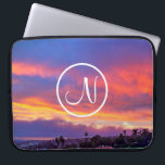 Pink yellow blue sunset photo custom monogram bold laptop sleeve<br><div class="desc">Type in the monogram letter of your choice and “make your own magic” whenever you use this stunning photography neoprene laptop sleeve comprised of a dramatically lit sunset in blue, pink, orange, and yellow. This laptop sleeve comes in three sizes: 15", 13", and 10”. Makes a great gift for someone...</div>