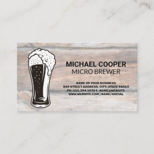 Pint Glass Over Flowing Wood Background Business Card