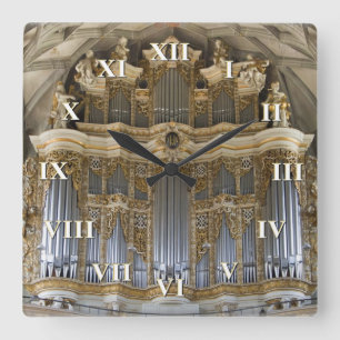 Pipe organ clock with roman numerals