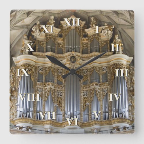 Pipe organ clock with roman numerals