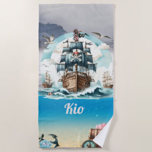 Pirate ship sailing the sea's Beach Towel