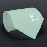 Pistachio Green Elegant Monogram   Name One-Sided Neck Tie<br><div class="desc">An elegant One-Sided necktie featuring a bold white monogram across a Pistachio Green background. On top of this monogram sits your first or last name spelled out in all capitals. If you prefer a bolder look for the personal name inside of the large letter you can do the following: Use...</div>