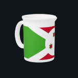 Pitcher with flag of Burundi<br><div class="desc">Add a touch of Burundian pride to your kitchen collection with our exclusive pitcher featuring the flag of Burundi! Crafted with meticulous attention to detail, this pitcher is more than just a functional item; it’s a celebration of Burundi’s heritage and cultural pride. The vibrant design prominently displays the iconic Burundian...</div>