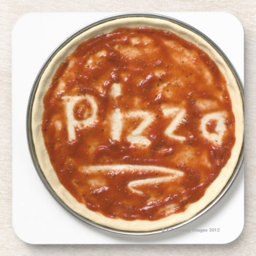 Pizza base with tomato sauce and the word beverage coaster