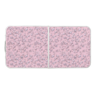 Placers of white-pink pearls on pink velvet beer pong table