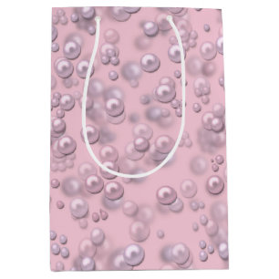 Placers of white-pink pearls on pink velvet medium gift bag