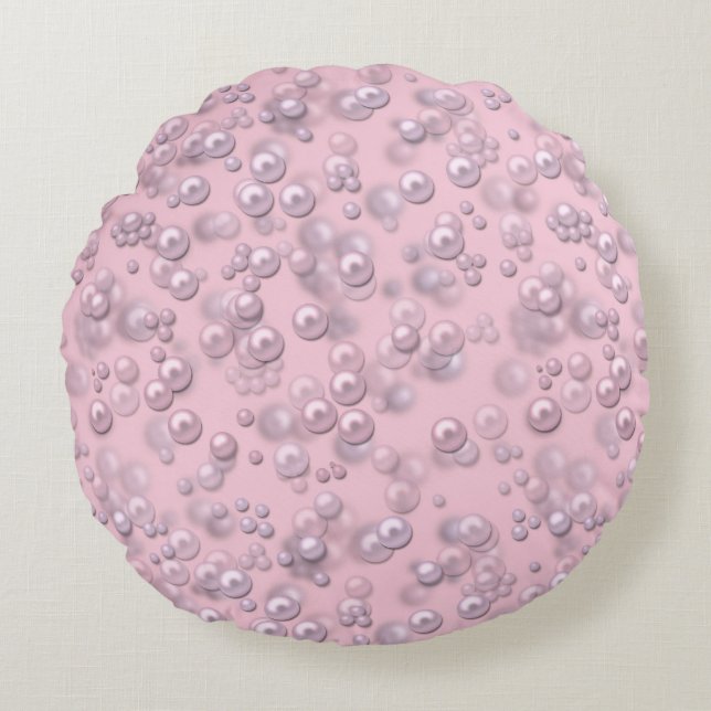 Placers of white-pink pearls on pink velvet round pillow (Front)