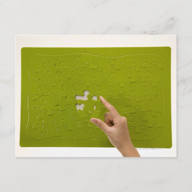 Placing a puzzle piece postcard (Front)