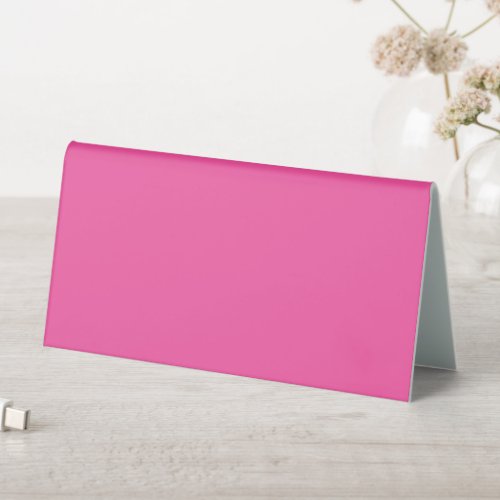 Plain bright hot pink table tent sign