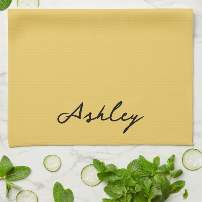 Plain gold script personalized kitchen towel (Folded)