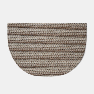 Plain knitted fabric, brown texture. doormat
