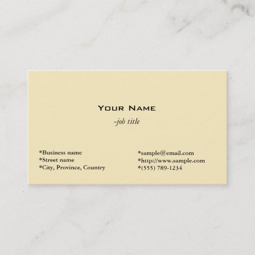 plain, light yellow business card.
