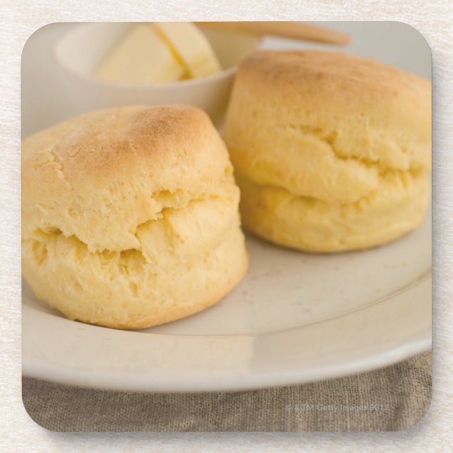 Plain scone with butter on plate drink coaster (Front)