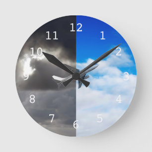 Plane flying out of stormy sky into blue sky round clock