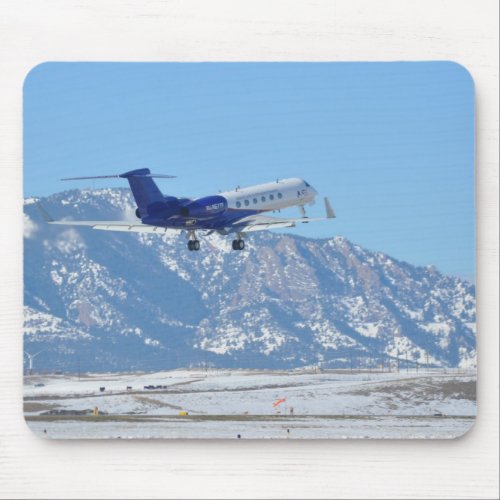 Plane taking off at the airport mouse pad