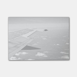 Plane Themed, Grayscale Airplane Wings Flying Over Post-it Notes
