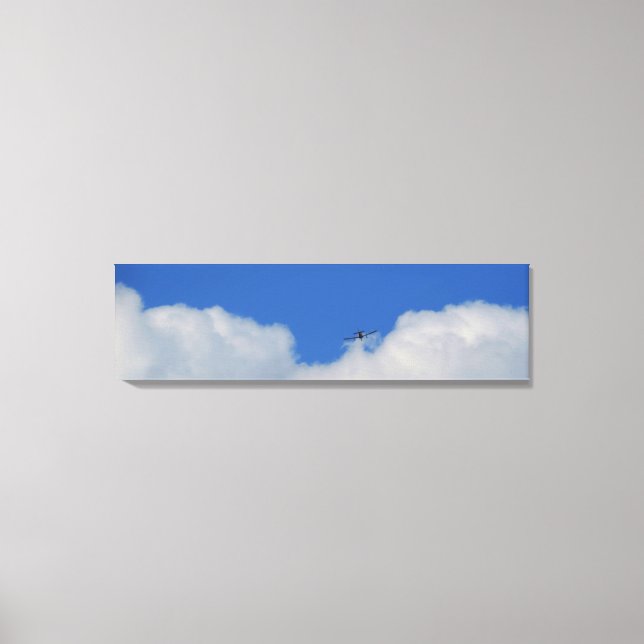 Plane With Clouds Panoramic Canvas Print (Front)