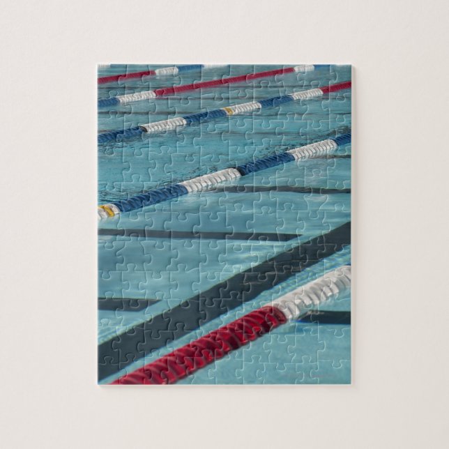 Plastic separators in a swimming pool creating jigsaw puzzle (Vertical)