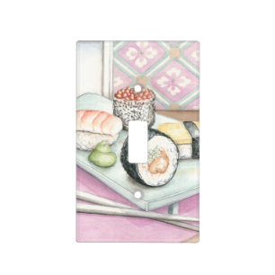 Plate of Assorted Sushi with Chopsticks