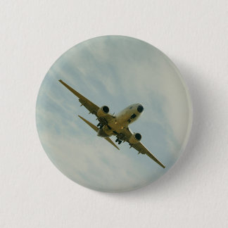 Plate with vintage airplane pinback button