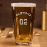 Player Name Jersey Number Game Day Party Sports Pint Glass<br><div class="desc">Create your own custom, personalized, cool stylish typography / font / script, monogrammed, game day party / sports win celebration player name jersey number, cool stylish, high quality, durable glass, beautiful laser engraved etched glassware 16 oz beer pint glass. The etching / engraving is permanent, flawless, dishwasher safe, and requires...</div>